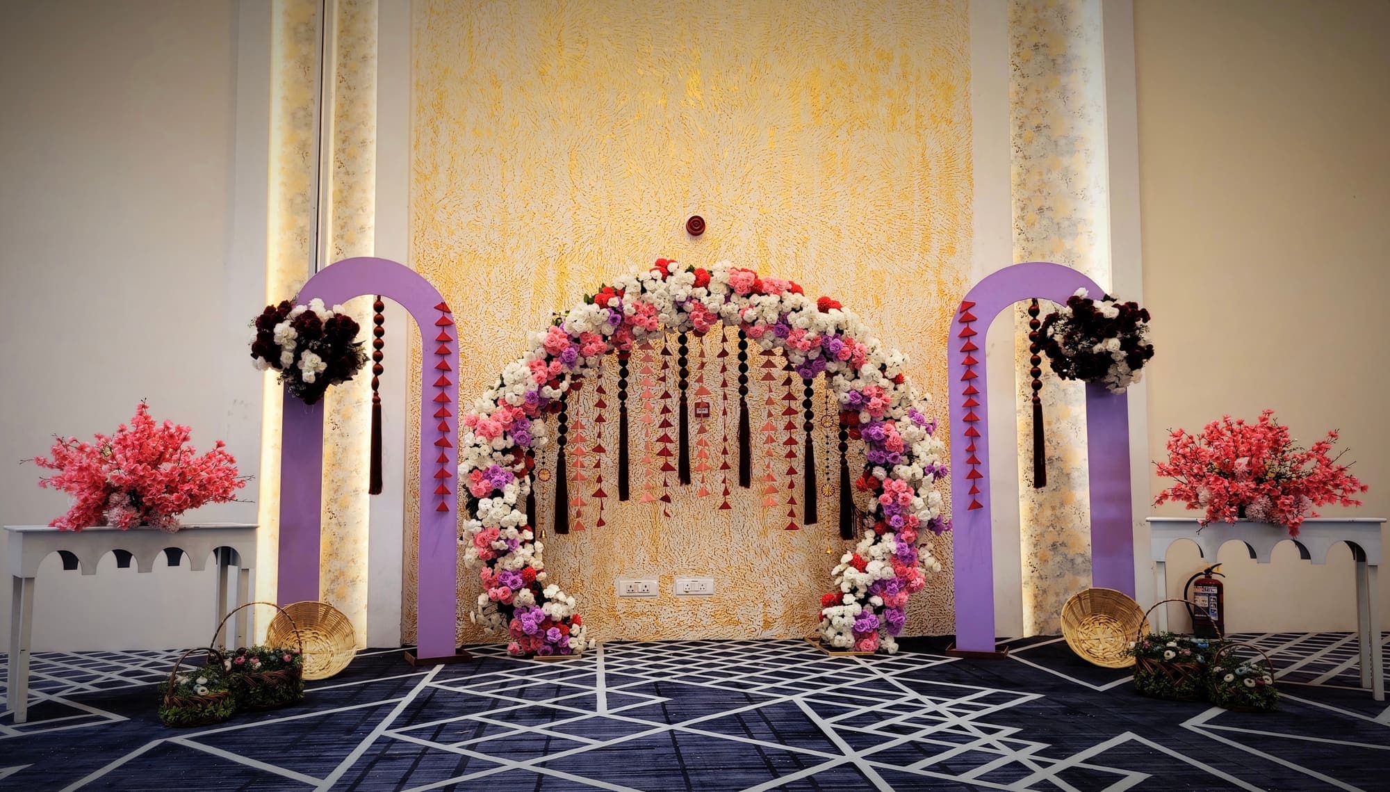 A circular floral ring opening onto the dance floor